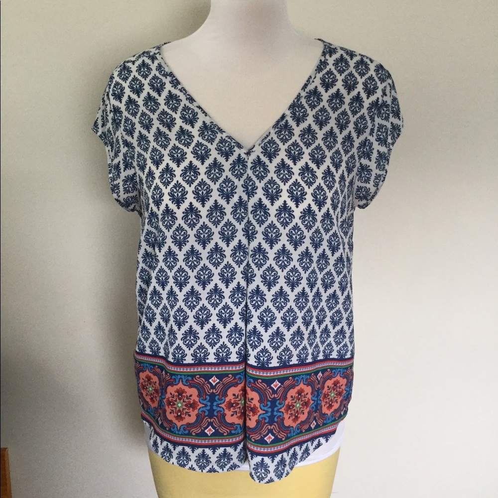 Flowy cap sleeve shirt